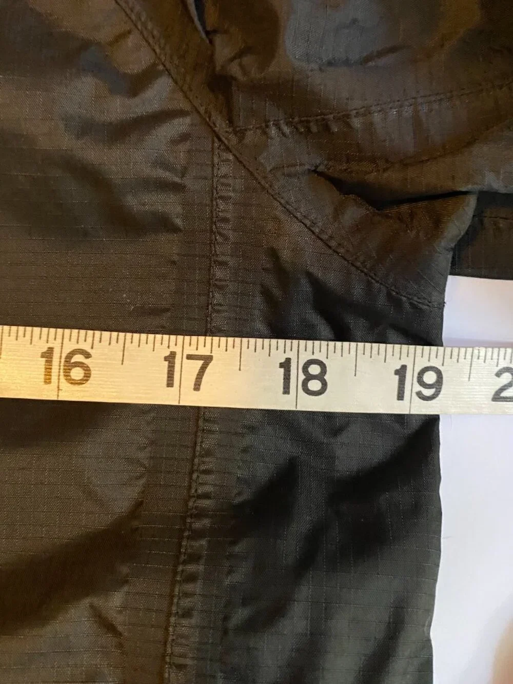 REI black raincoat - Boy's Large